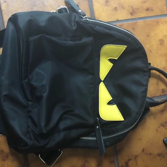 backpack with yellow eyes